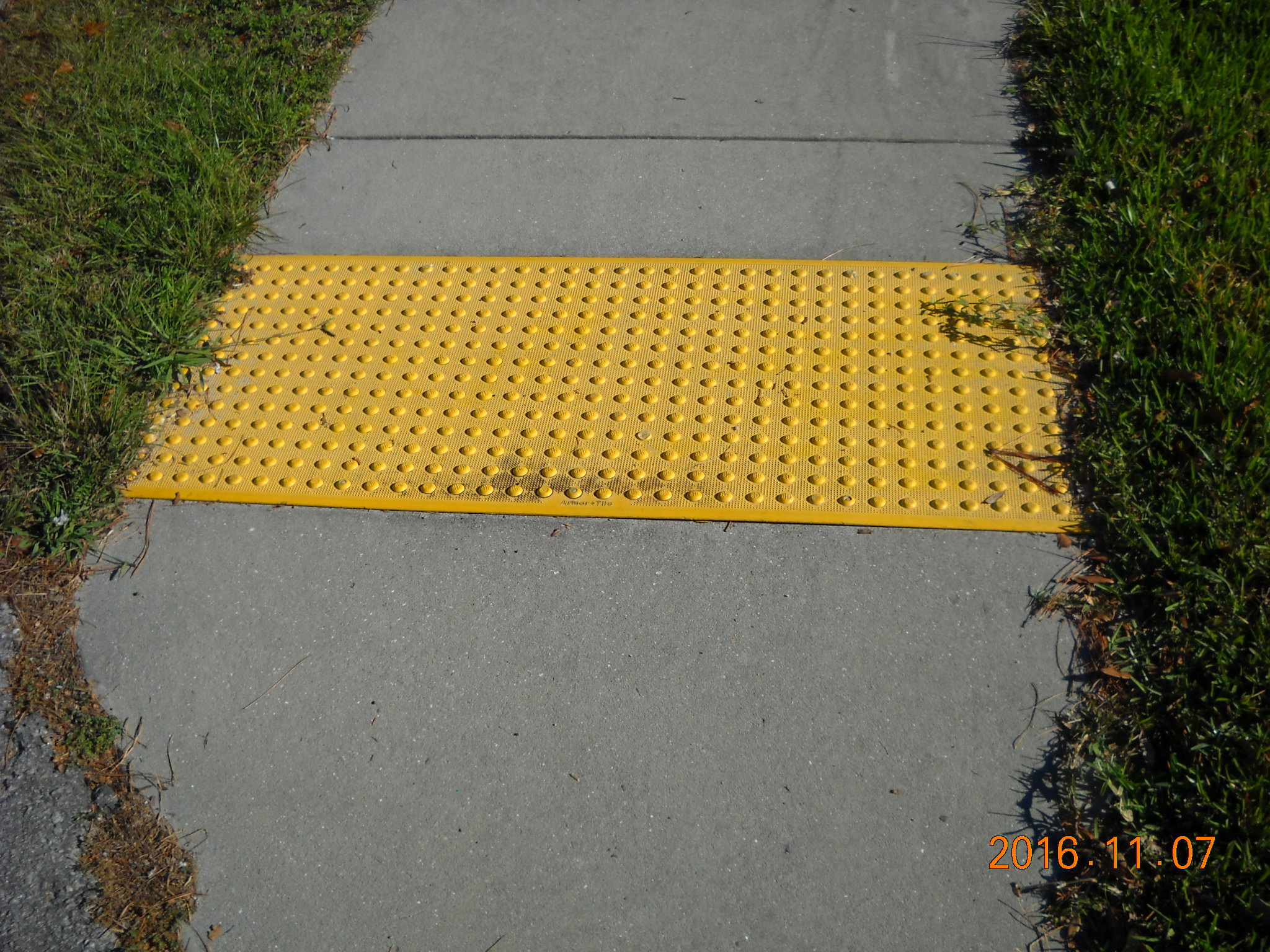 yellow ADA tile